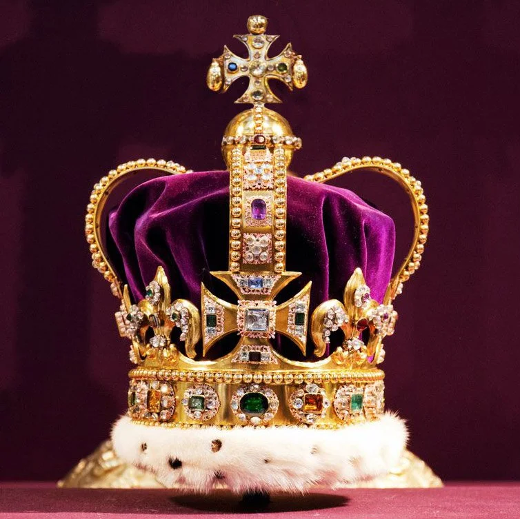 British crown paired with Tyrian purple mantle — symbol of enduring royal authority